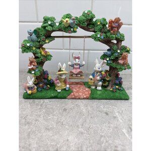Easter jubilee bunnies swinging. Designed and sculpted by Jaimy. Like New!